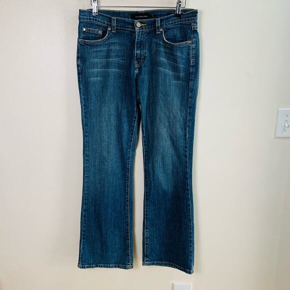 Calvin Klein Size S8 L32 Women's Mid Rise Flare Jeans Faded Blue Pockets - Picture 2 of 9